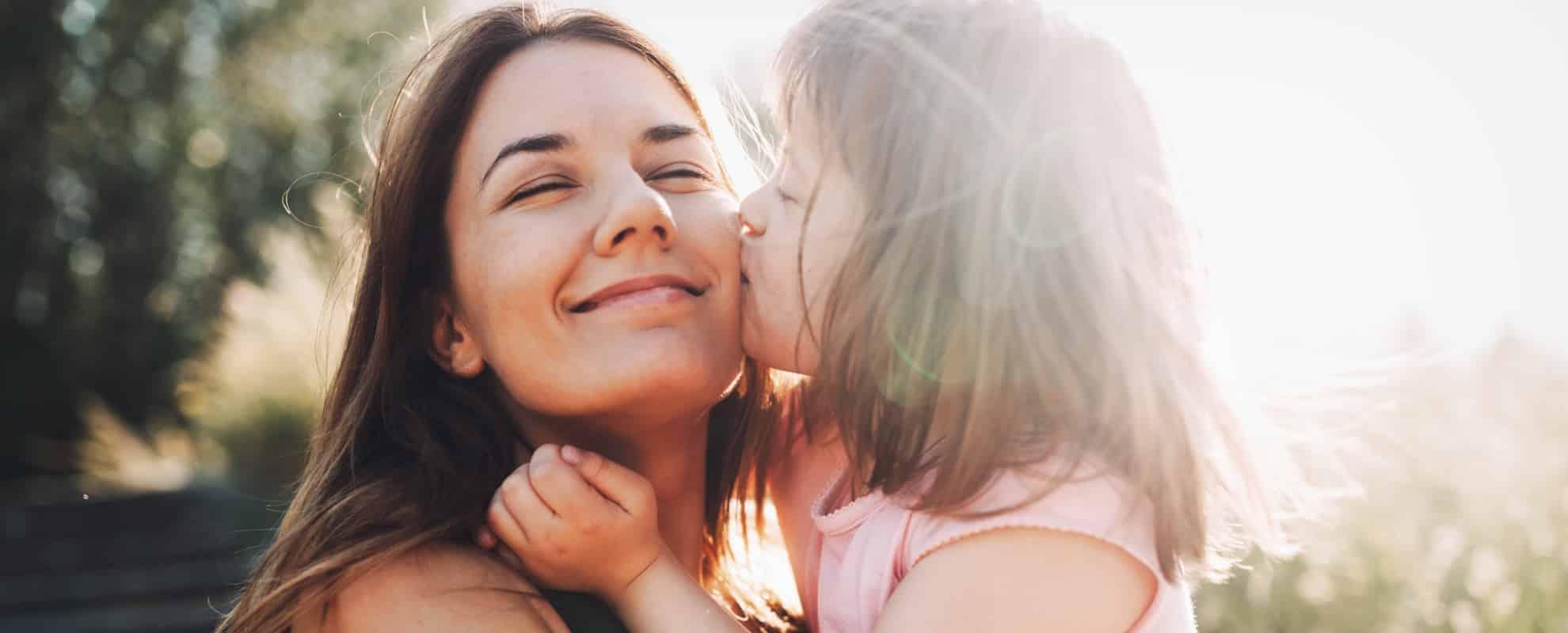 Mother and child with special needs sharing a happy moment
