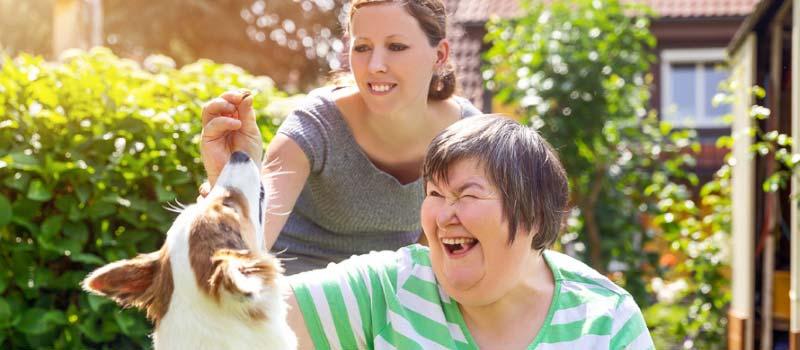 Support worker helping a participant at home